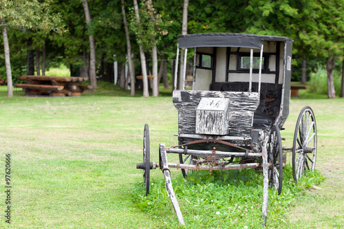 Old style stage coach on field