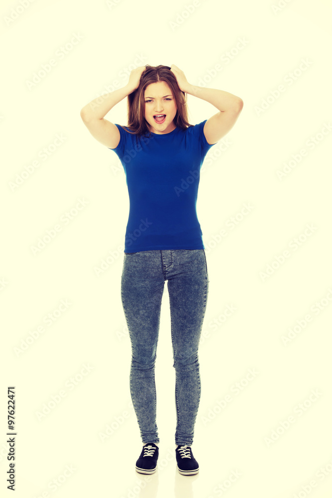 Frustrated young woman screaming. Frustrated young woman screaming.