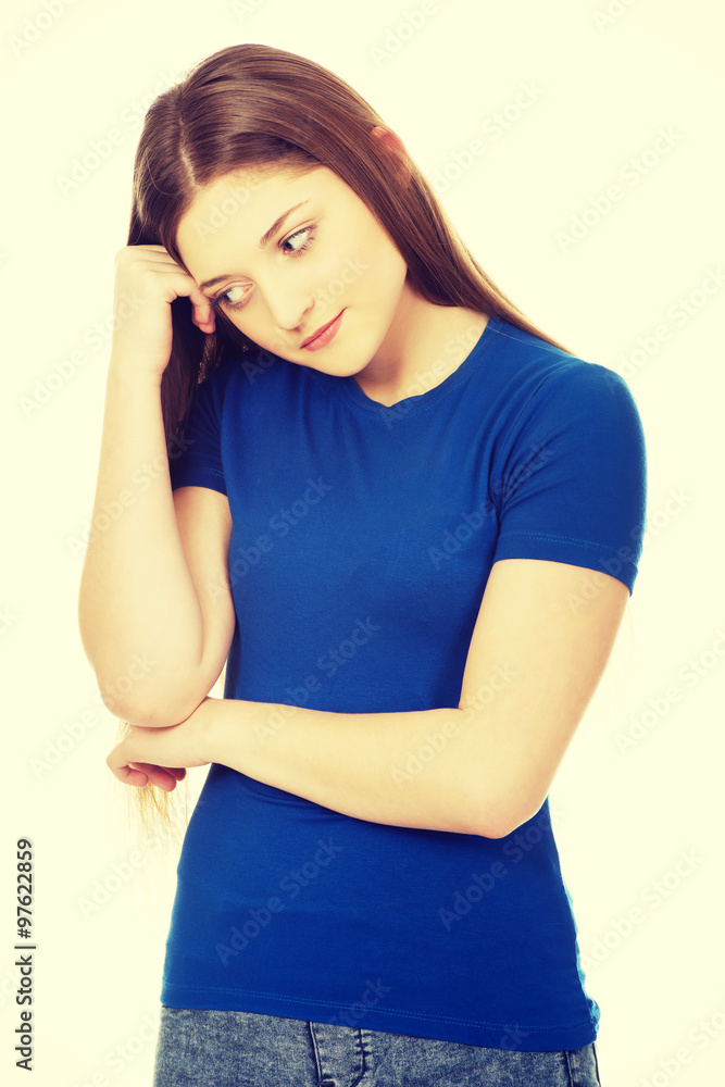 Beautiful worried teenage woman. Beautiful worried teenage woman.