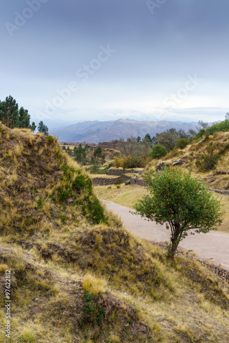 Empty mountain road against blue sky, Cusco, Peru
