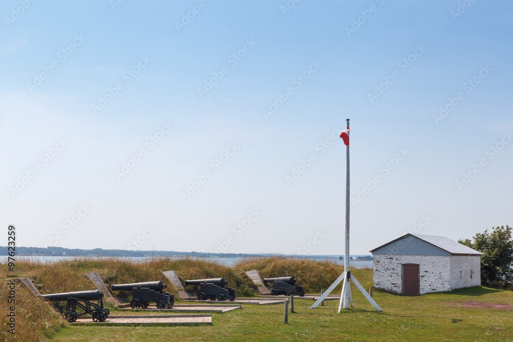 Cannons and Canadian flag in Victoria Park, Charlottetown, Prince Edward Island, Canada Cannons and Canadian flag in Victoria Park, Charlottetown, Prince Edward Island, Canada