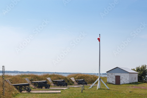 Cannons and Canadian flag in  Victoria Park, Charlottetown, Prince Edward Island, Canada