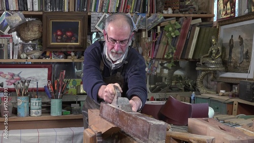 carpenter working in his workshop photo