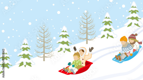 Sledding Children in winter slope