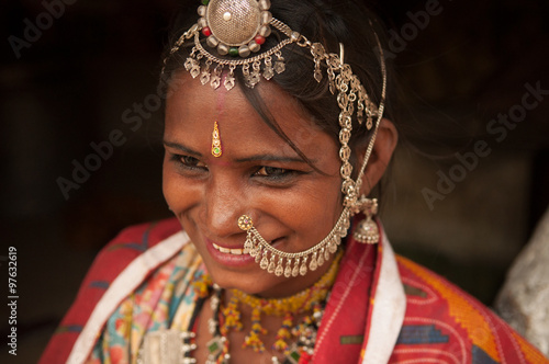 Traditional Indian female in sari smiling