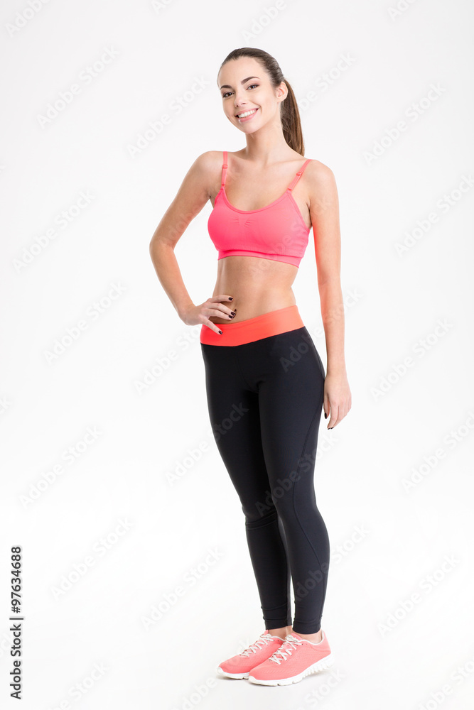 Full length portrait of a smiling sports woman Full length portrait of a smiling sports woman