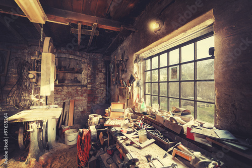 Slika na platnu Vintage stylized old carpenter workshop interior