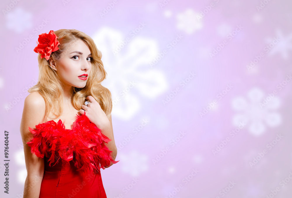 Pretty girl in dress on blurred digital snowflakes blue background