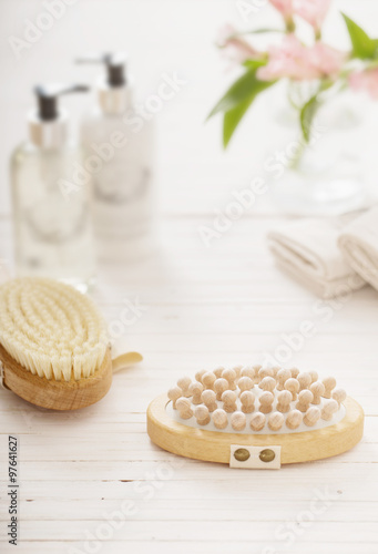 Wood massage brush on white background