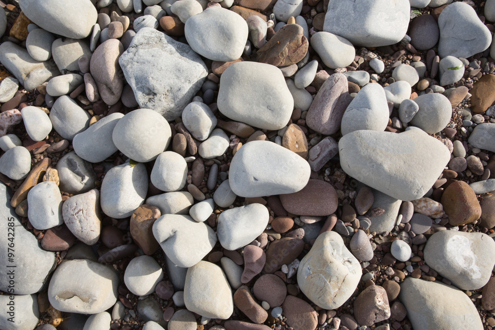 Grey pebbles stones and shingle background texture beach St Audries Bay Somerset uk Grey pebbles stones and shingle background texture beach St Audries Bay Somerset uk