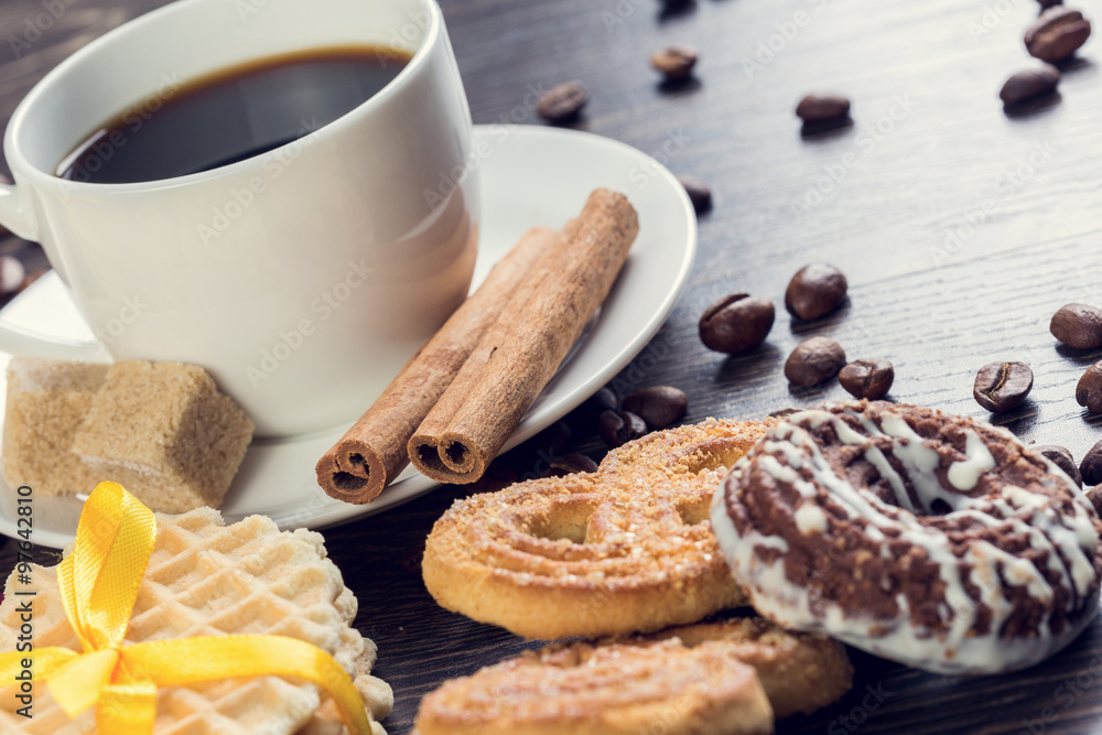 Biscuits and coffee on table Biscuits and coffee on table