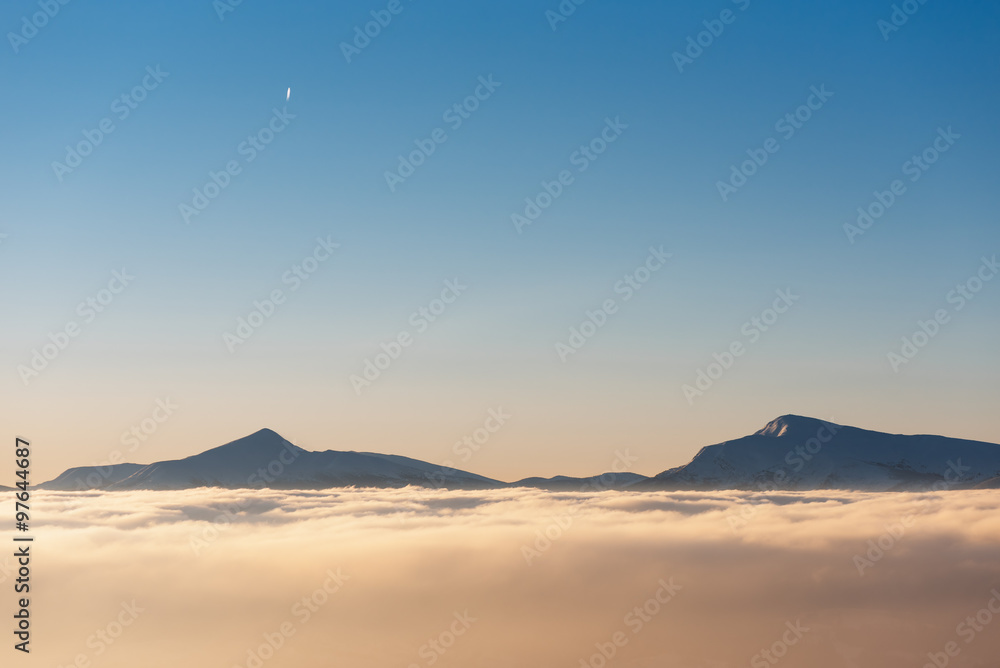 Tops of mountains in clouds Tops of mountains in clouds