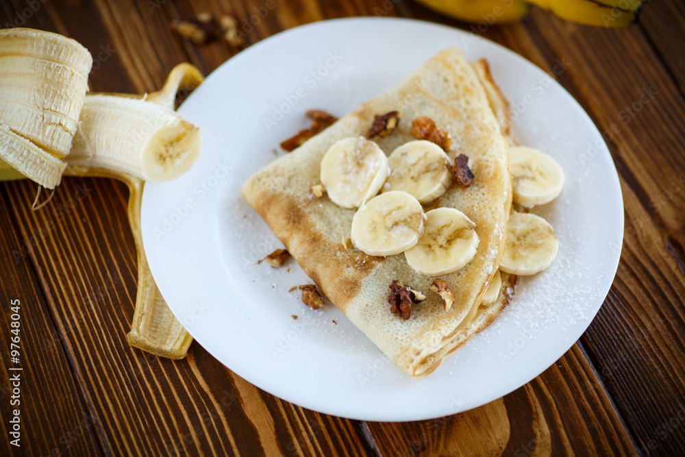 sweet pancakes with bananas and nuts 