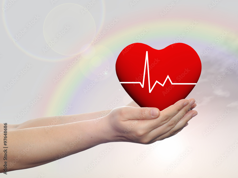 Human hand with heart and rainbow Human hand with heart and rainbow