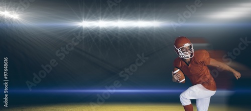 Composite image of rugby player holding the balll