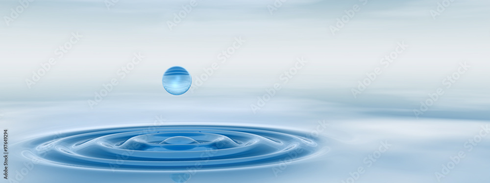Conceptual blue liquid drop falling in water banner Conceptual blue liquid drop falling in water banner