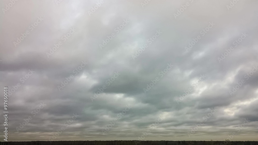 Time-lapse of sky with moving clouds from left to right at sunset Time-lapse of sky with moving clouds from left to right at sunset