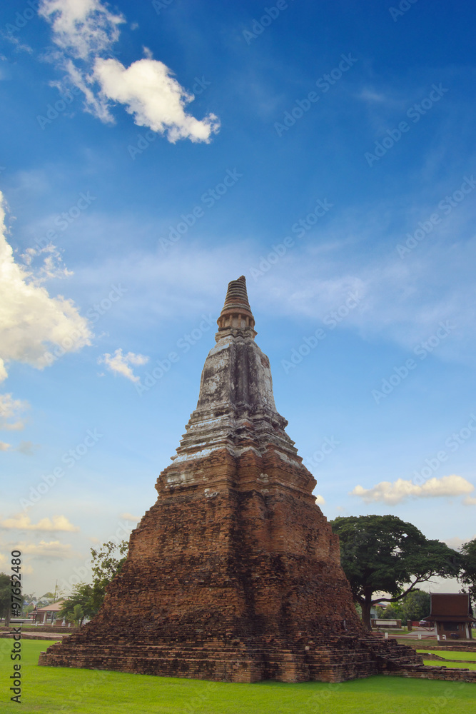 Old buddha pagoda temple with cloudy sky in Ayuthaya Thailand