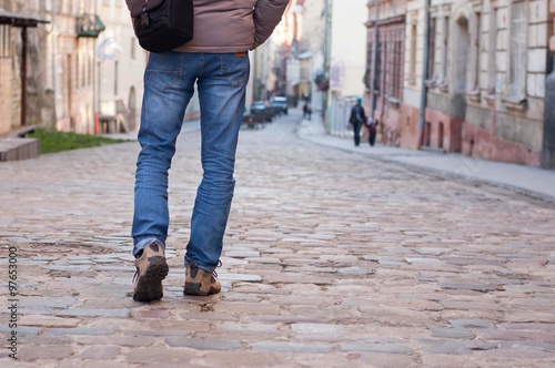 lone man walking Town