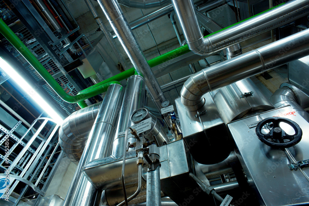 Equipment, cables and piping as found inside of a modern industr Equipment, cables and piping as found inside of a modern industr