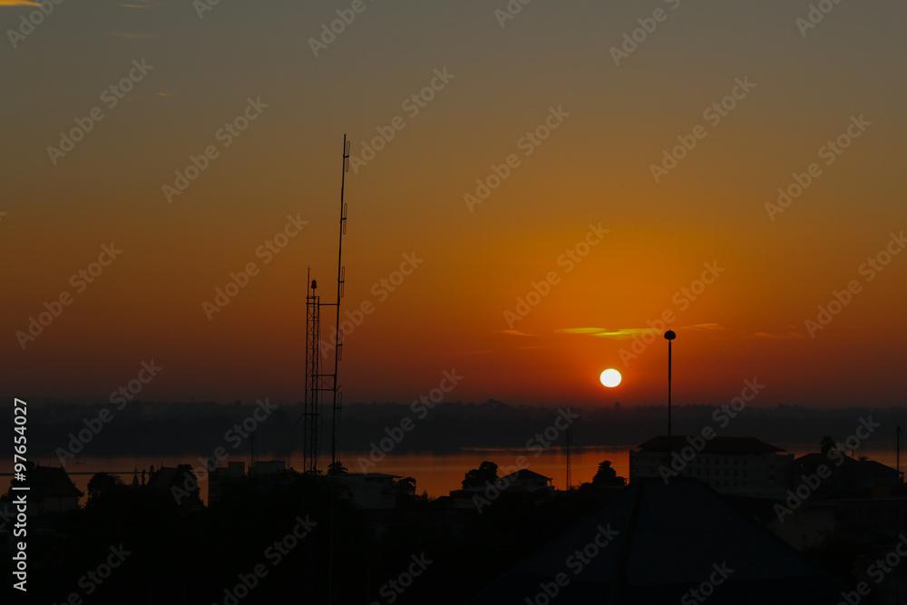 Sunrise over Mekong River in a Mukdahan city skylin