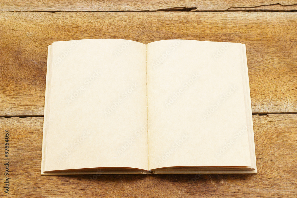 Fototapeta premium Open Notebook page on wooden table
