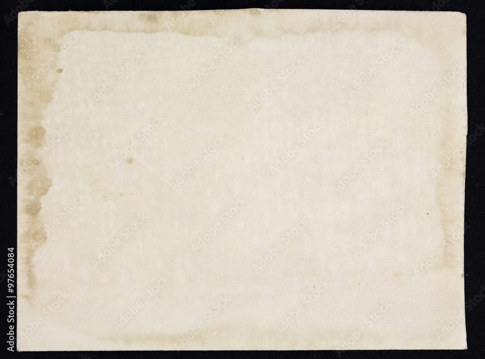Old grunge paper sheet, isolated on black background. Old grunge paper sheet, isolated on black background.