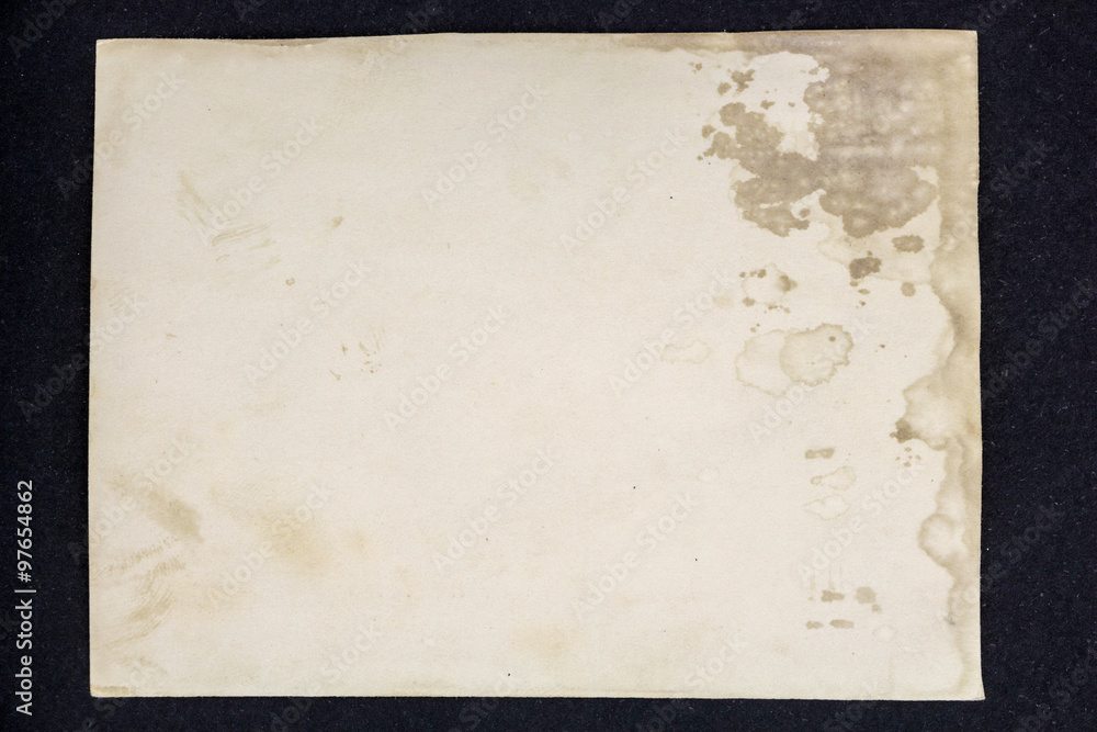 Old grunge paper sheet, isolated on black background. Old grunge paper sheet, isolated on black background.