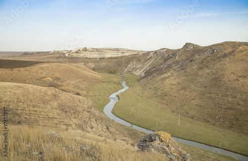 Small river and hills in prairie