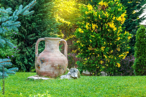ancient amphora in garden