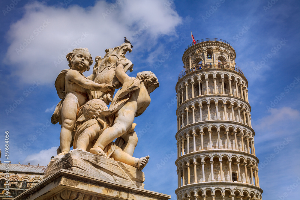 Angels and the famous Leaning tower in Pisa, Italia