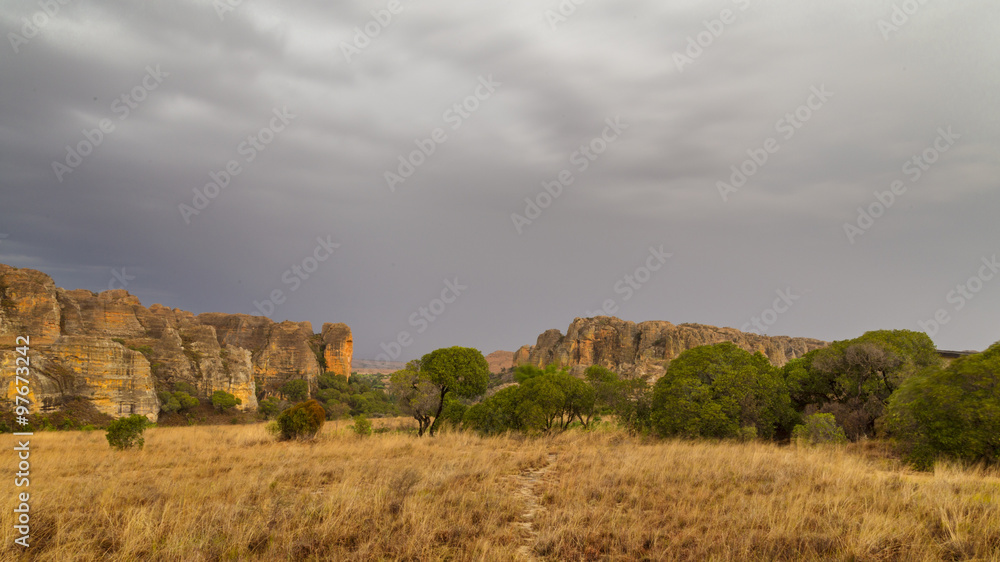 Rainstorm is coming on a yellow rocky desert in Madagascar Rainstorm is coming on a yellow rocky desert in Madagascar