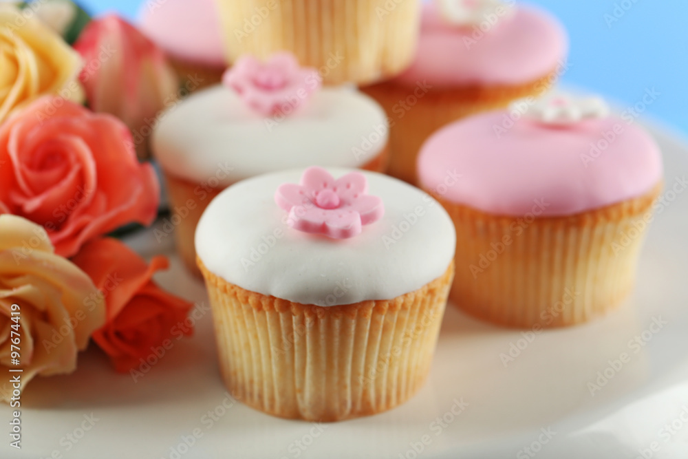 Tasty cupcake on stand, close-up