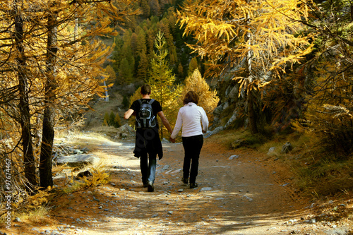 Couple hiking in the forest in the mountains © saaraah97