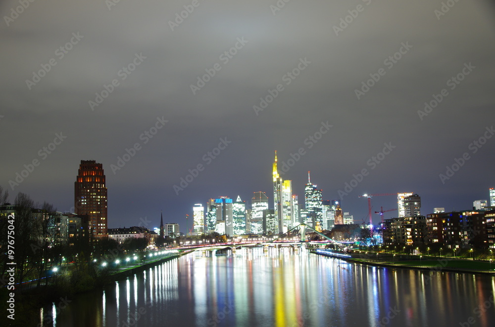 Naklejka premium Frankfurt City with enlightened skyscrapers