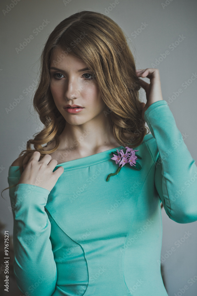 Studio portrait of a girl in a turquoise dress 4444. Studio portrait of a girl in a turquoise dress 4444.