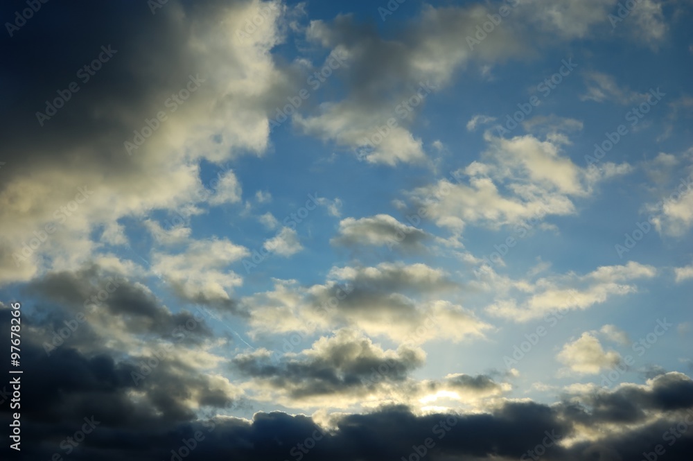 gray clouds in the blue sky