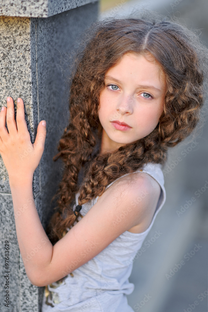 portrait of little girl outdoors in summer portrait of little girl outdoors in summer