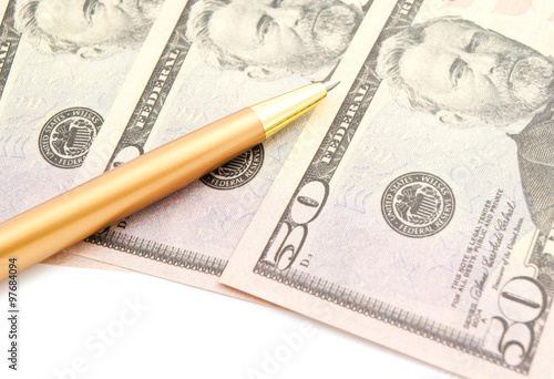 dollars banknotes and pen