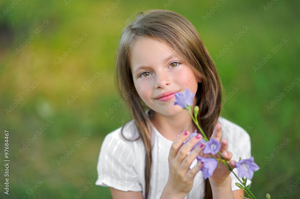 portrait of little girl outdoors in summer portrait of little girl outdoors in summer