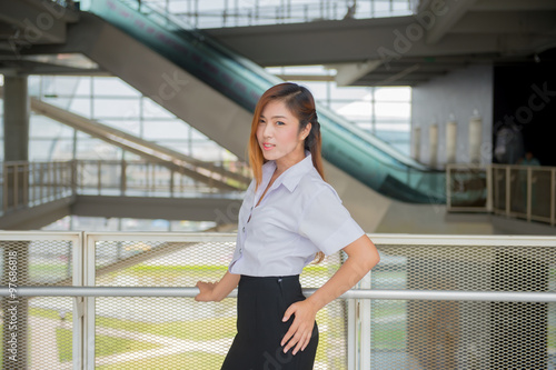 young attractive asian  girl in a uniform of university  Cute sc