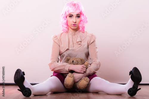 фотографія childlike woman with teddy bear toy