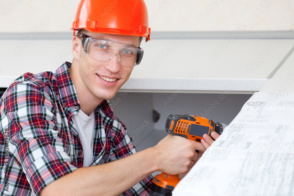 repairman with electric drill repairman with electric drill
