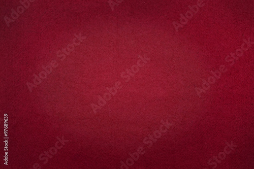 Poker table felt background in red color