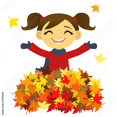 Girl playing in a pile of leaves