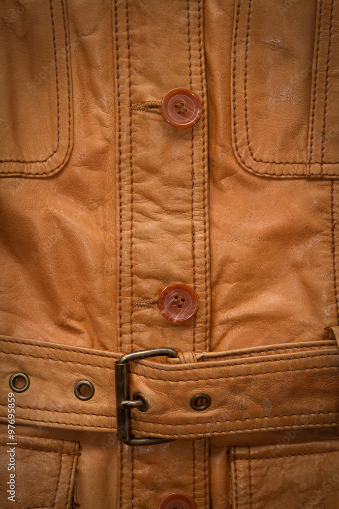 Texture a shabby brown leather jacket. Texture a shabby brown leather jacket.
