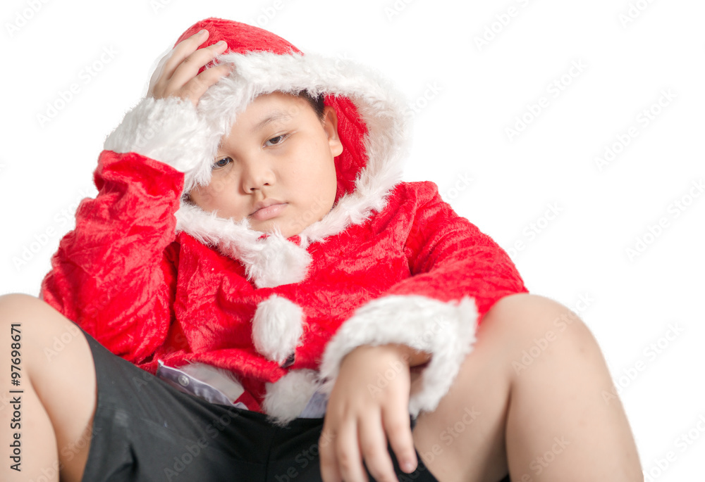 Sad fat boy waiting for Christmas presents Sad fat boy waiting for Christmas presents