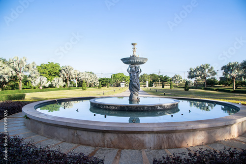 Fountain in green garden, Thailand