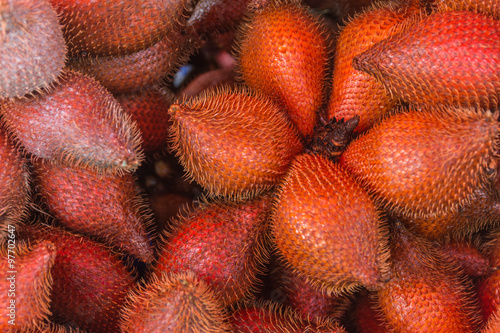 Red tropical fruit Salacca or zalacca.There are both sweet taste