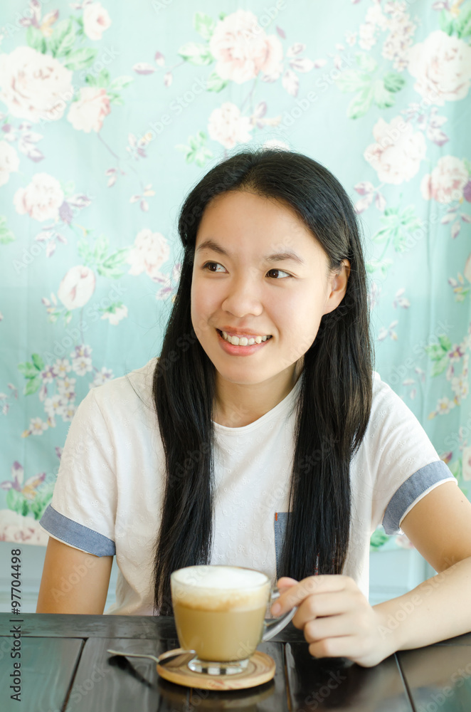 Young asian woman drinking coffee in the morning Young asian woman drinking coffee in the morning